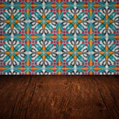 Image showing Wood table top and blur vintage ceramic tile pattern wall