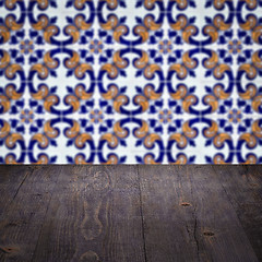 Image showing Wood table top and blur vintage ceramic tile pattern wall