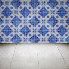 Image showing Wood table top and blur vintage ceramic tile pattern wall