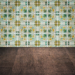 Image showing Wood table top and blur vintage ceramic tile pattern wall