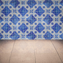 Image showing Wood table top and blur vintage ceramic tile pattern wall