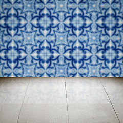 Image showing Wood table top and blur vintage ceramic tile pattern wall