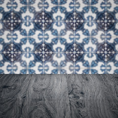 Image showing Wood table top and blur vintage ceramic tile pattern wall