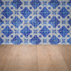 Image showing Wood table top and blur vintage ceramic tile pattern wall