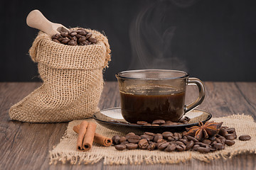 Image showing Coffee cup with burlap sack