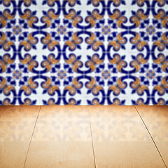 Image showing Wood table top and blur vintage ceramic tile pattern wall