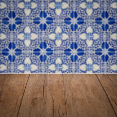 Image showing Wood table top and blur vintage ceramic tile pattern wall