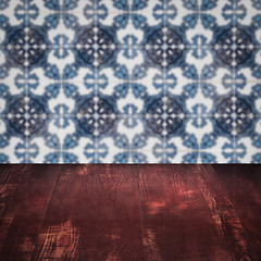 Image showing Wood table top and blur vintage ceramic tile pattern wall