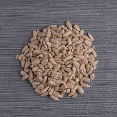 Image showing Circle of shelled sunflower seeds