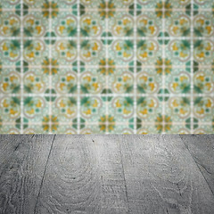 Image showing Wood table top and blur vintage ceramic tile pattern wall