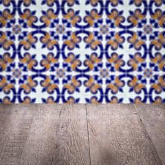 Image showing Wood table top and blur vintage ceramic tile pattern wall