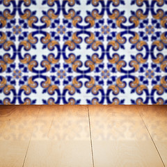 Image showing Wood table top and blur vintage ceramic tile pattern wall