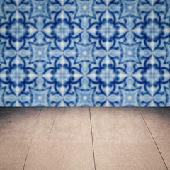 Image showing Wood table top and blur vintage ceramic tile pattern wall