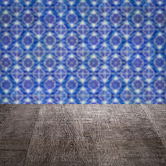 Image showing Wood table top and blur vintage ceramic tile pattern wall