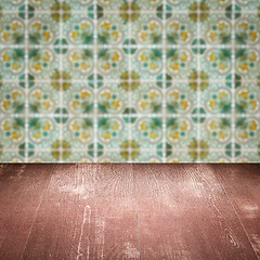 Image showing Wood table top and blur vintage ceramic tile pattern wall