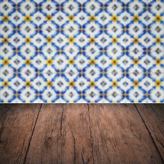 Image showing Wood table top and blur vintage ceramic tile pattern wall