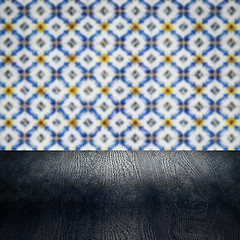 Image showing Wood table top and blur vintage ceramic tile pattern wall