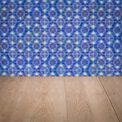 Image showing Wood table top and blur vintage ceramic tile pattern wall