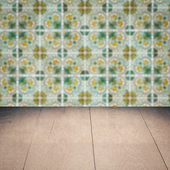 Image showing Wood table top and blur vintage ceramic tile pattern wall