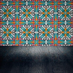 Image showing Wood table top and blur vintage ceramic tile pattern wall