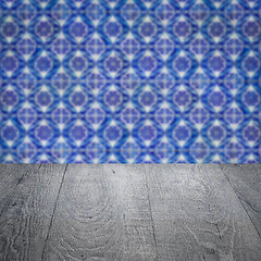 Image showing Wood table top and blur vintage ceramic tile pattern wall