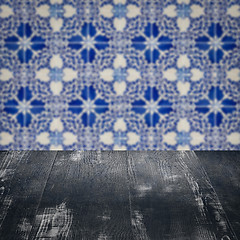 Image showing Wood table top and blur vintage ceramic tile pattern wall