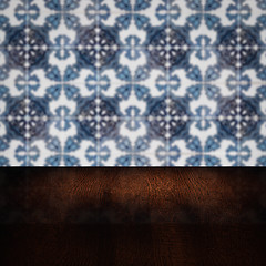 Image showing Wood table top and blur vintage ceramic tile pattern wall