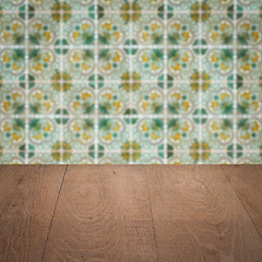 Image showing Wood table top and blur vintage ceramic tile pattern wall