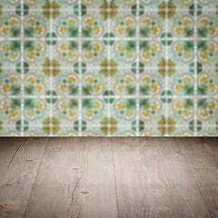 Image showing Wood table top and blur vintage ceramic tile pattern wall