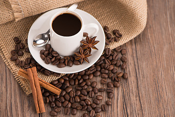 Image showing Coffee cup with burlap sack