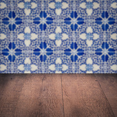 Image showing Wood table top and blur vintage ceramic tile pattern wall