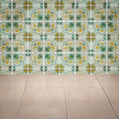 Image showing Wood table top and blur vintage ceramic tile pattern wall