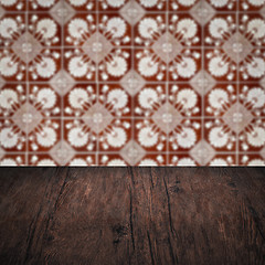 Image showing Wood table top and blur vintage ceramic tile pattern wall