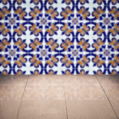 Image showing Wood table top and blur vintage ceramic tile pattern wall