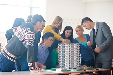 Image showing group of students with teacher on class