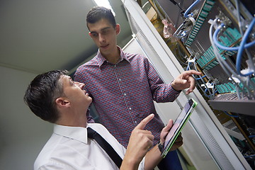 Image showing network engineers in server room