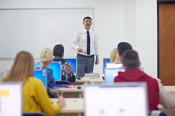 Image showing students with teacher  in computer lab classrom