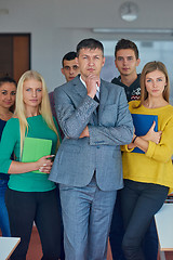Image showing group portrait of teacher with students