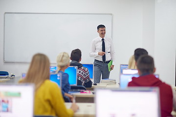 Image showing students with teacher  in computer lab classrom