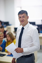 Image showing students with teacher  in computer lab classrom