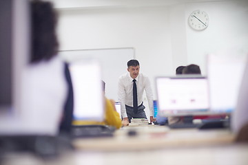 Image showing students with teacher  in computer lab classrom