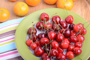 Image showing mandarin and cherry fresh fruits and berries, summer health food