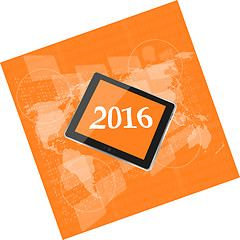 Image showing tablet pc or smart phone on business digital touch screen, world map, happy new year 2016 concept