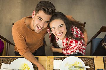 Image showing Young couple at the restaurant