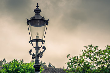 Image showing Vintage street lamp in cloudy weather