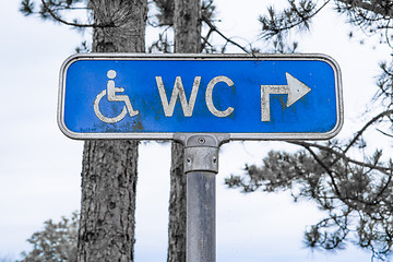 Image showing Outdoor toilet sign in blue color