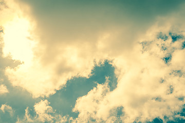 Image showing Sun behind white clouds