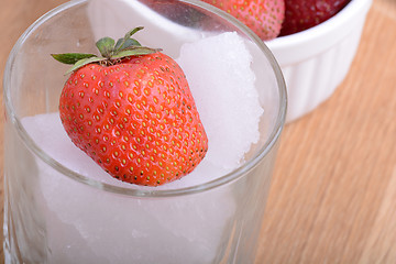 Image showing strawberry frozen in ice cube, health food concept