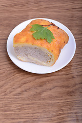 Image showing fresh beef meat fillet with raw kale leafs on white plate