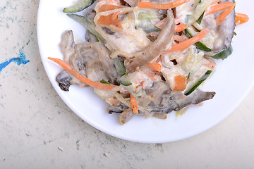 Image showing mushroom salad with champignon and fresh carrots, white plate on white plate with watercolor